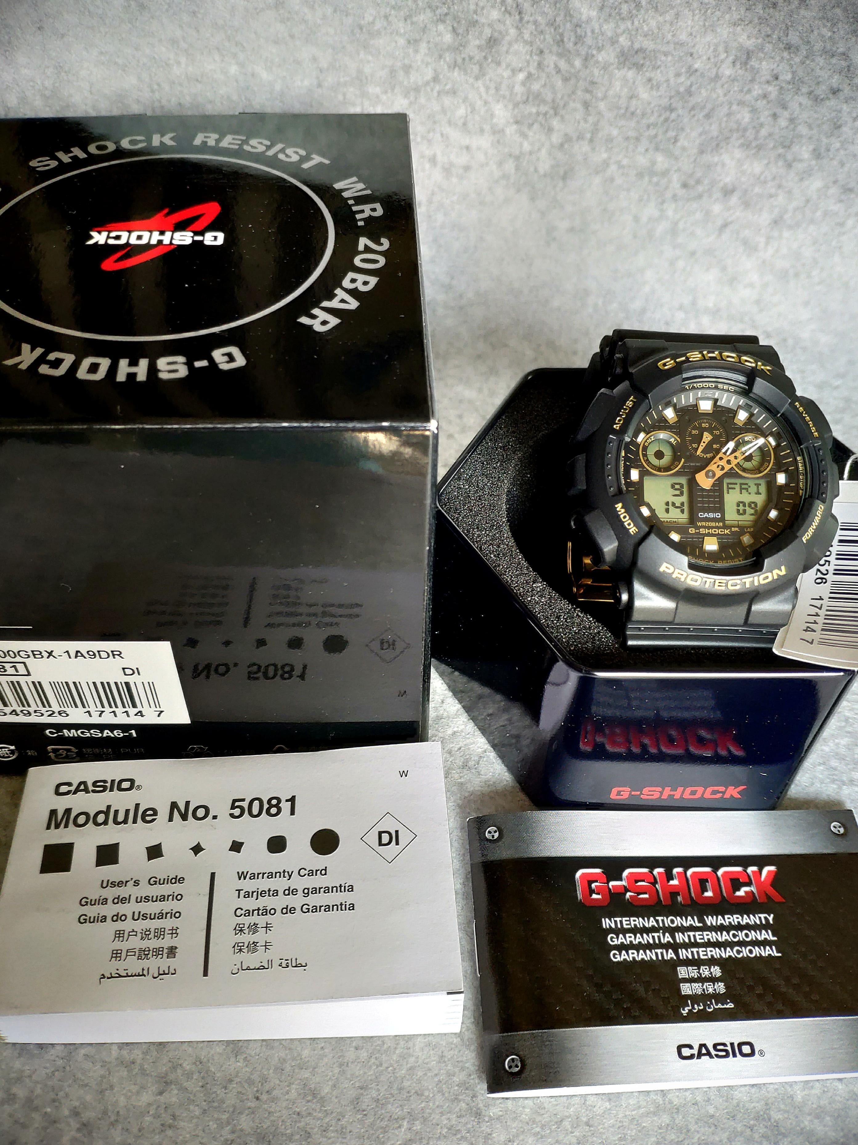 Casio G-Shock Analog-Digital Black x Gold Accents Watch GA100GBX-1A9DR - Prestige