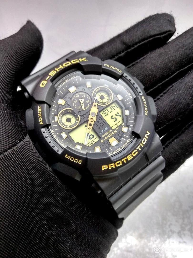 Casio G-Shock Analog-Digital Black x Gold Accents Watch GA100GBX-1A9DR - Prestige
