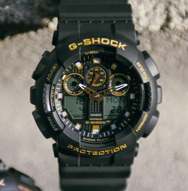 Casio G-Shock Analog-Digital Black x Gold Accents Watch GA100GBX-1A9DR - Prestige
