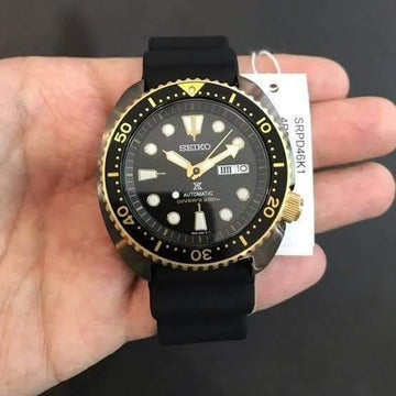 Seiko prospex black and on sale gold